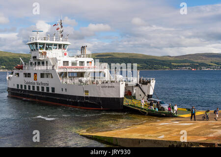 Millport, Scotland - August 3, 2017: Passengers disembarking from The Loch Shira operated by Caledonian MacBrayne Stock Photo