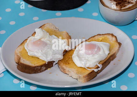 Two poached eggs on toast Stock Photo