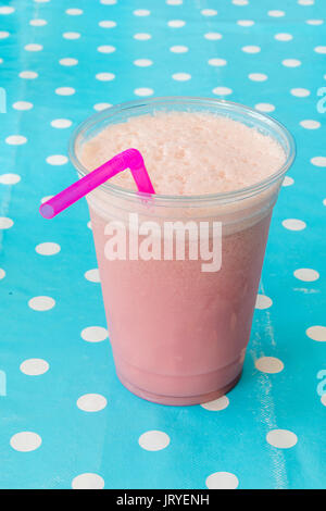 Milkshake clear plastic Cup Stock Photo - Alamy