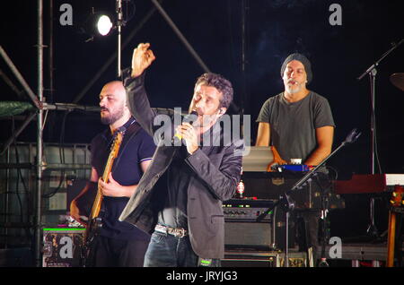 Fiesole, IT - July 25, 2017 - The italian singer and songwriter Daniele Silvestri performs at the roman theater of Fiesole. Stock Photo