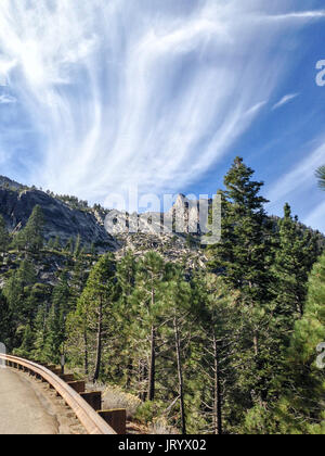 View up the mountains from the side of a highway in the Californian Sierra Nevada.
