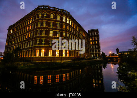 Old Anchor Mill Sits On River Cart in paisley Stock Photo