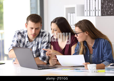 Business team of entrepreneurs working together on line in a new project at office Stock Photo