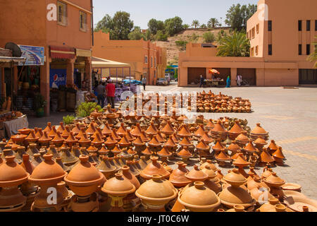 Tajine, traditional clay pot using to prepare vegetables with meat. Ouarzazate market. Morocco, Maghreb North Africa Stock Photo