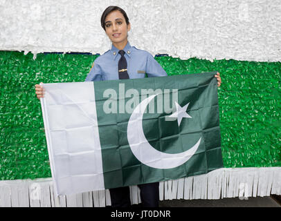 A Pakistani American girl who is traning at the Police Academy to be a New York City policewoman. At the Pakistan Day Parade in Manhattan, NYC. Police Stock Photo