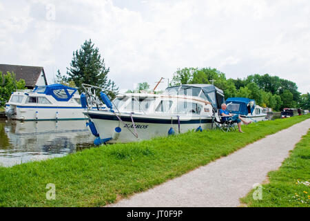 Canal craft moored on the Lancaster Canal at Bilsborrow, Lancashire Stock Photo