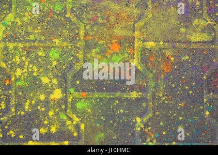 Multi-colored earth, paving slabs, powder coated with dry colors at the Holi festival in Gatchina, Russia Stock Photo