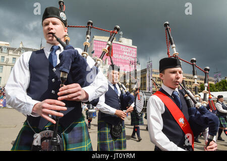 George Square, Glasgow, Scotland, UK. 7th Aug, 2017 Piping Live! - the Glasgow International Piping Festival began today under threatening skies. Pipe bands from around the world will be performing and competing at the week long bag pipe festival ahead of the World Pipe Band Championships also held in Glasgow on the 11th and 12th August  Credit: Kay Roxby/Alamy Live News Stock Photo