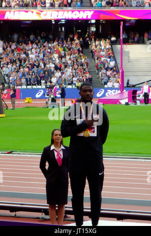 Justin Gatlin poses with his gold medal at the men's 100m award ceremony at the London 2017 IAAF World Championships in London, UK, 06 August 2017. Stock Photo