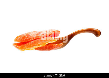 Dry mango in the wooden spoon, isolated on white background. Stock Photo