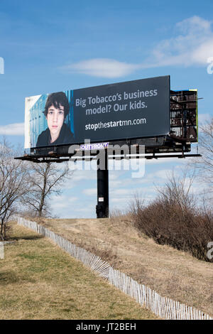 Oakdale, Minnesota. Anti-smoking sign. Because of tobacco industry’s use of social media, coupons, concert promotions and other tactics aimed at youth Stock Photo