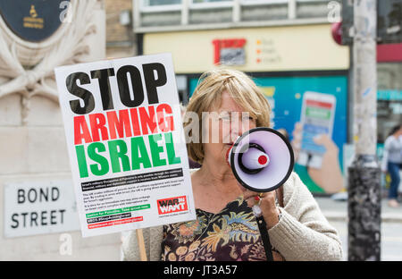Woman protesting against the HSBC for allegedly helping to finance arms to Israel. Stock Photo
