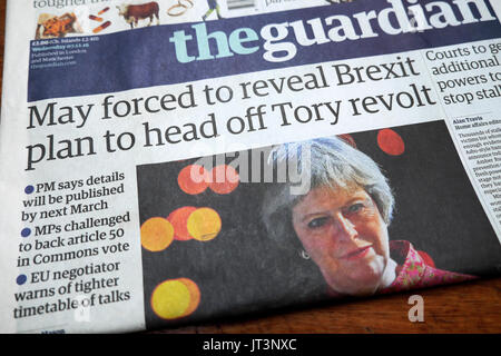 Guardian newspaper headline 'May forced to reveal Brexit plan to head off Tory revolt'  7th December 2016 Stock Photo