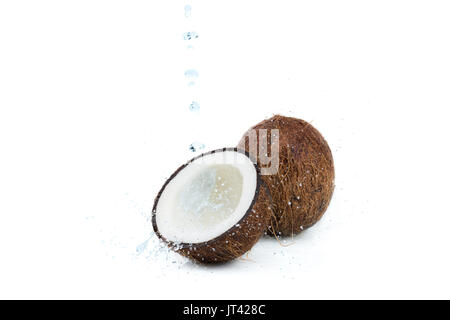 fresh ripe tropical coconuts with water isolated on white, coconut Stock Photo