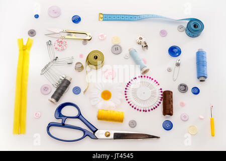 Top view of sewing kit and set of sewing supplies isolated on grey Stock Photo