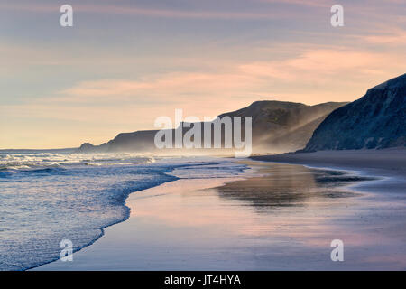 A view of the Praia do Castelejo, and the Costa Vicentina coast at dawn