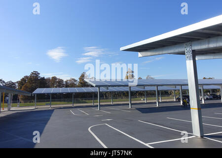 HOUSTON, USA - JANUARY 12, 2017: Some cars parked, with a solar panel protecting from the sun the cars in Legoland park, Legoland is a theme park based on the popular LEGO brand of building toys Stock Photo