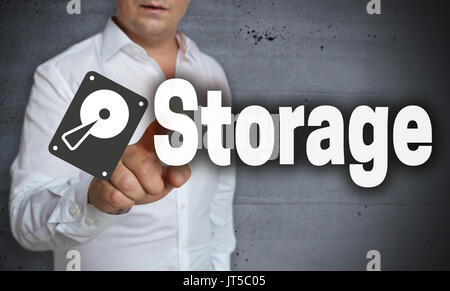 Storage touchscreen is operated by man. Stock Photo