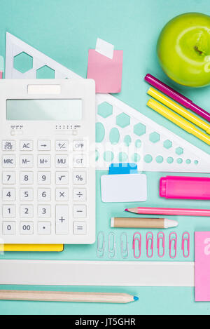 flat lay with various school supplies on colorful surface Stock Photo