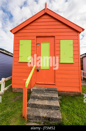 Colorful beach side huts on Devon coast of England Stock Photo