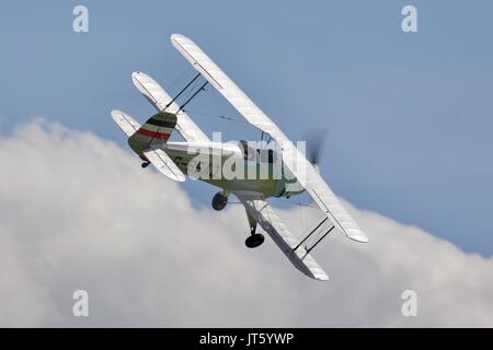 Bücher Jungmann G-BSAJ with the 1936 Berlin Olympics colour scheme Stock Photo