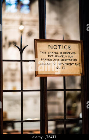 NEW YORK, USA - October 14, 2016. Little Note about Respecting Privaty or Prayers Inside of Trinity Church Located on Wall Street and Broadway, Manhat Stock Photo