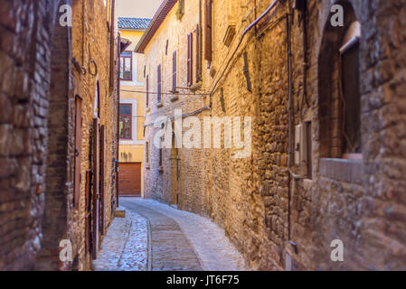 View of a typical alley of Spello, a medieval and beautiful town in Umbria. Stock Photo