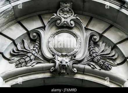 Stucco molding over a door into a private residence. Stock Photo