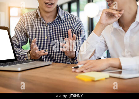 Team work process. young business managers working with startup project. analyze graph plan and presentation Stock Photo
