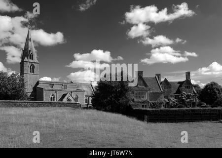 All Saints Church and Pilton Manor, Pilton village, Northamptonshire, England, UK Stock Photo