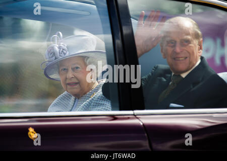 Her Majesty Queen Elizabeth II accompanied by HRH Prince Philip, Duke of Edinburgh leave ZSL Whipsnade Zoo after opening The Centre  for Elephant Care Stock Photo