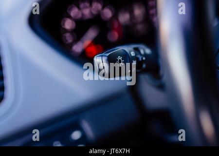 Close up on car lights switch. Car interior Stock Photo