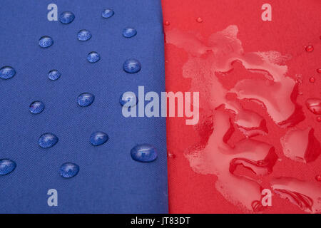 two fabric textile. blue is waterproof and red is none waterproof absorb water Stock Photo