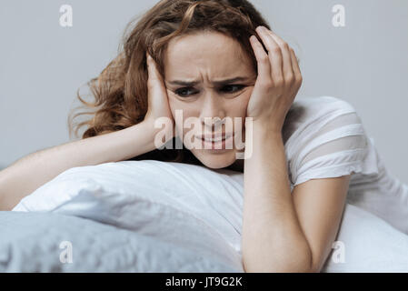 Beautiful young woman having problems Stock Photo