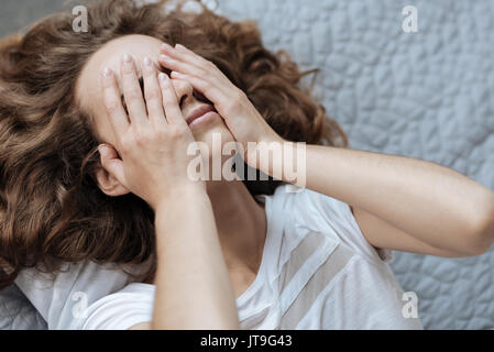 Sad young woman feeling unhappy Stock Photo