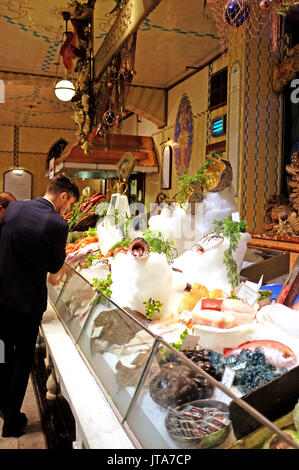 London UK - Fresh fish counter in the Food Hall at Harrods Department store in Knightsbridge Stock Photo