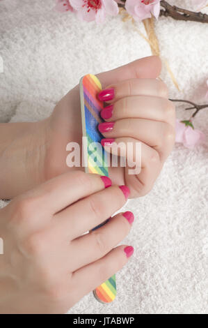 Manicure process in beauty salon Stock Photo