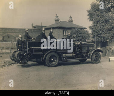 Firemen with fire engine, Fire brigade, c1930s, historic archive photograph Stock Photo