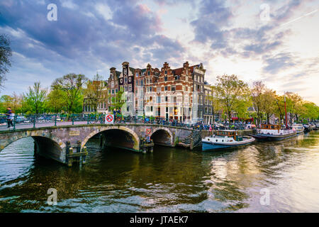 Traditional Dutch gabled houses and canal, Amsterdam, Netherlands, Europe Stock Photo