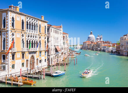 Vaporettos passing Palazzo Cavalli-Franchetti and the Santa Maria della Salute on the Grand Canal, Venice, UNESCO, Veneto, Italy Stock Photo