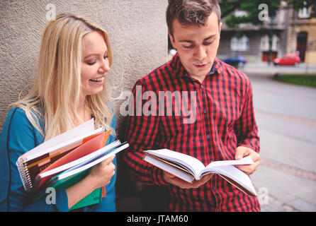 Two young students studying outside Stock Photo