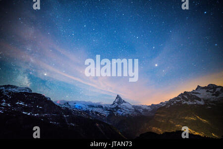 Starry night in Alps, Matterhorn Peak, Zermatt, Switzerland Stock Photo