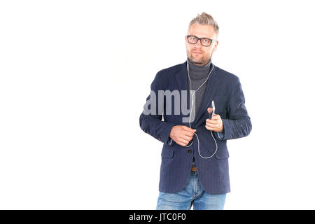 Listening to music on smartphone Stock Photo