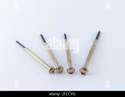 screwdriver mini tool on a white background chromed steel with crosshead tip Stock Photo