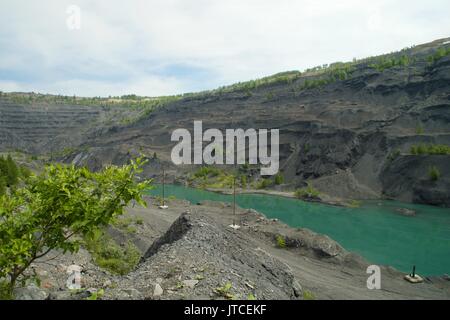 Abandoned quarry for coal mining in the Kemerovo region Stock Photo
