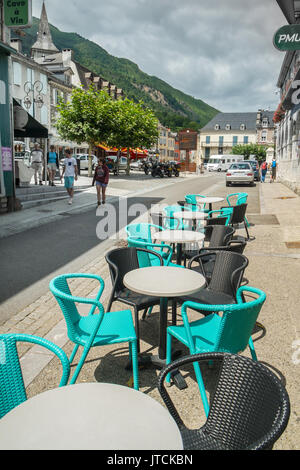 Cafe chairs and tables on terrace, Laruns, Pyrénées-Atlantiques, France. Stock Photo