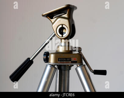 Vintage metal tripod for analog photography Stock Photo