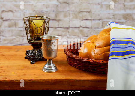 Shabbat Shalom - Traditional Jewish Sabbath ritual challah bread, wine Stock Photo