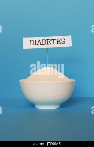 White ceramic cup with sugar and diabetes sign Stock Photo