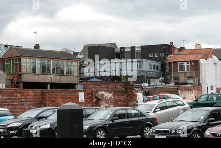 England, Car Park, Parked Cars, Parking, Group of Cars, Different Buildings, Building Structures, Architecture, Overcast Weather, Cloudy Stock Photo